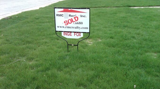 photo psychology today sold sign on house IMG00049-20110505-1112-2