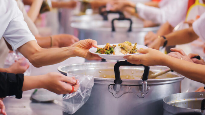 Sharing of food from volunteer hands to homeless people : The concept of feeding